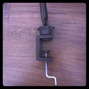 Manikin stand for state board cosmetology exam.